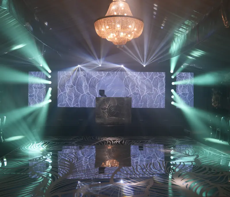 Ballroom with chandelier and beams ready for the grand entrance